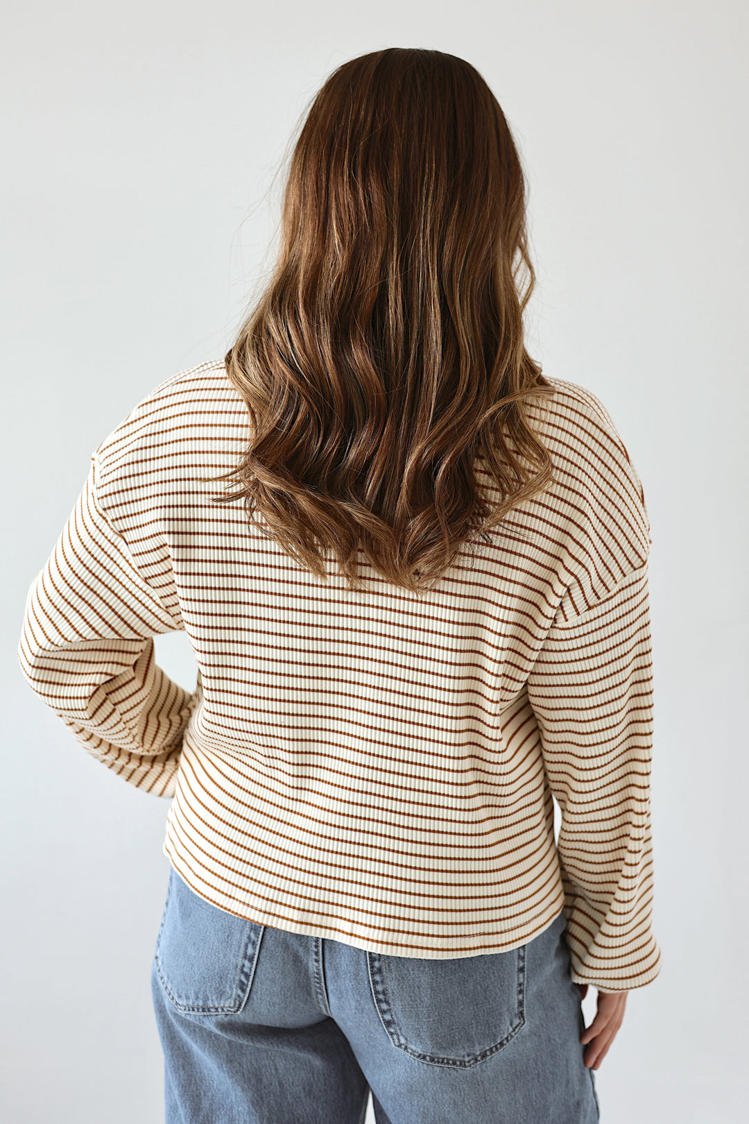 Back view of the Alessia striped ribbed top showing its relaxed silhouette