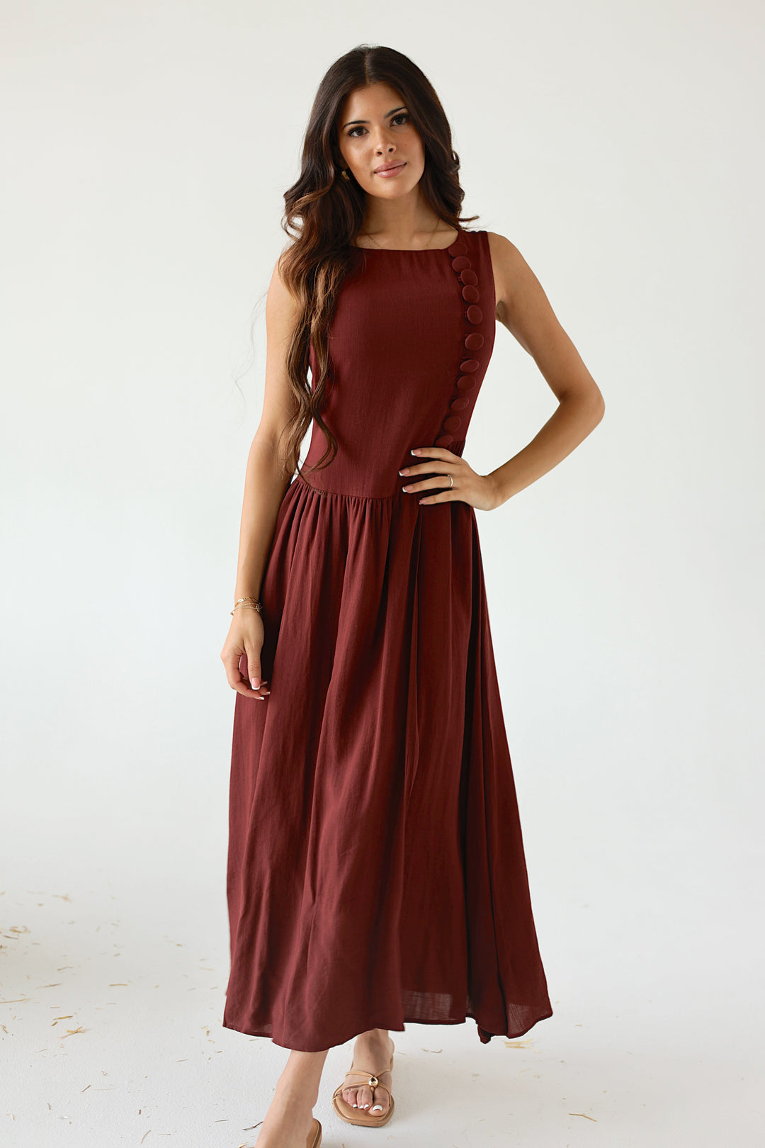 Margot burgundy midi dress featuring a flowy skirt and covered buttons