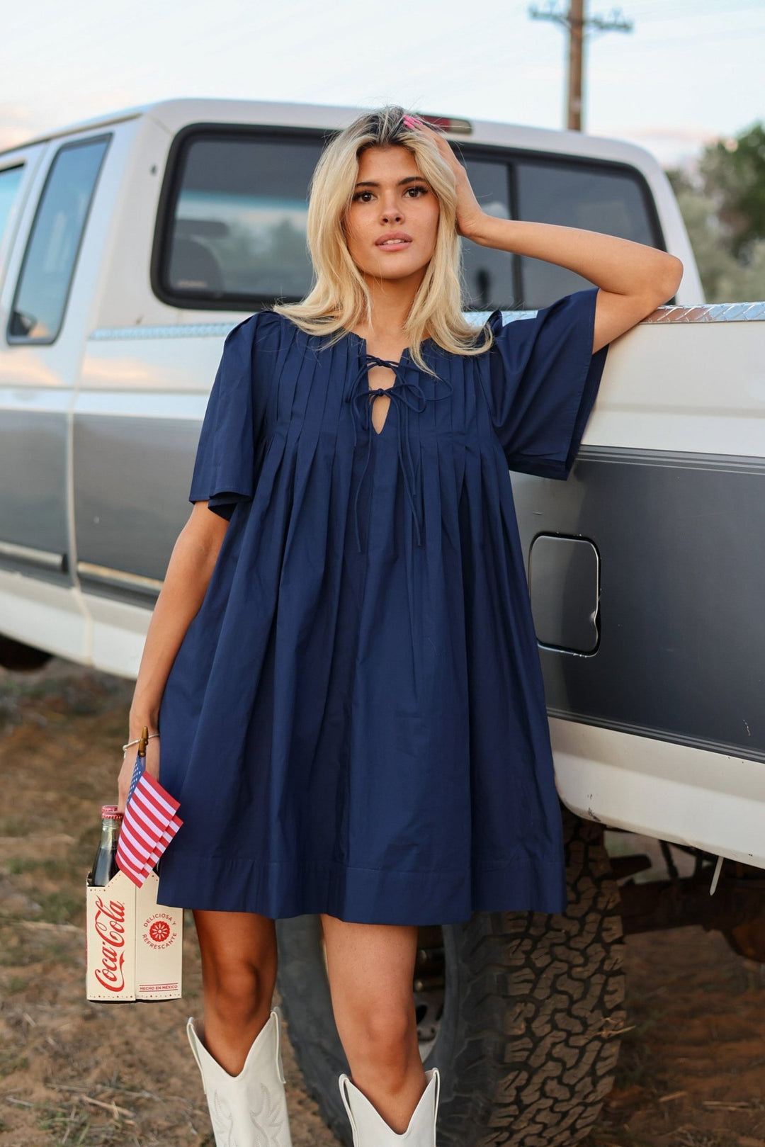 Georgia Pleated Cotton Mini Dress with Flared Sleeves - Bacio & Co.
