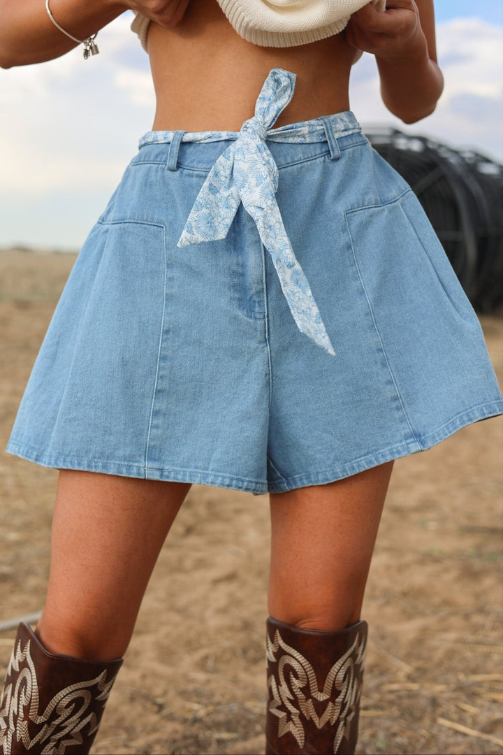 Savannah High - Rise Flounce Denim Shorts with Floral Sash - Bacio &amp; Co.